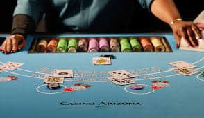 Texas Hold'em Bonus payout table and hand rankings displayed on fatcai interface